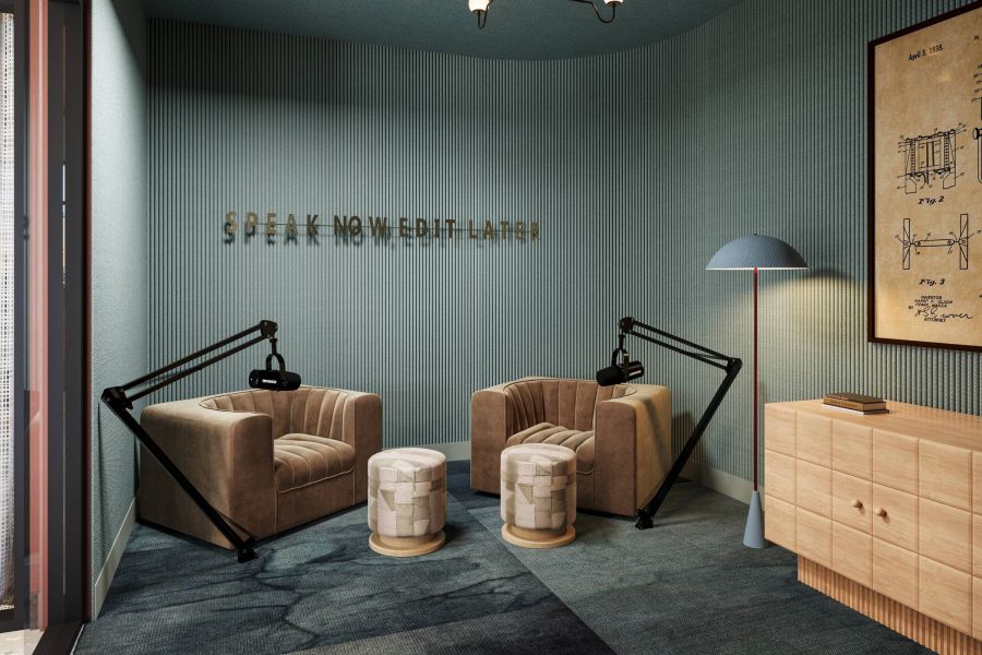 Ever College Station student living apartments Modern podcast studio with two armchairs, microphones, stools, and wall art reading "SPEAK NOW EDIT LATER.