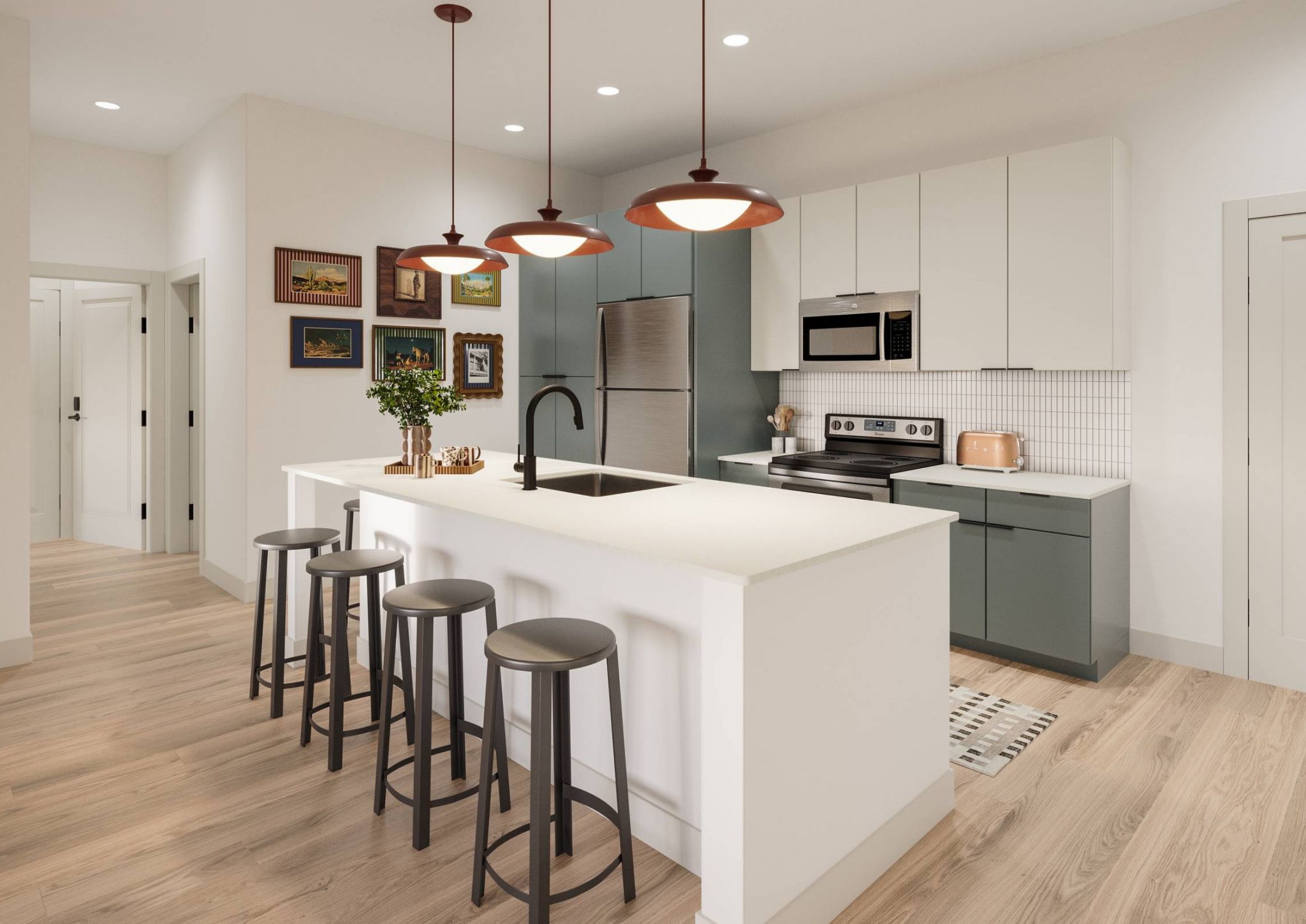 Ever College Station student living apartments Modern kitchen with white island, three stools, pendant lights, and green and white cabinets.
